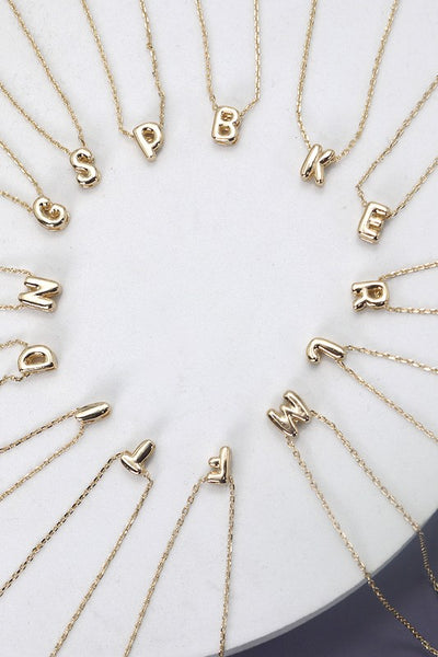 tiny initial necklace / gold