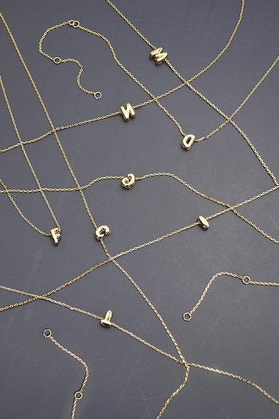 tiny initial necklace / gold