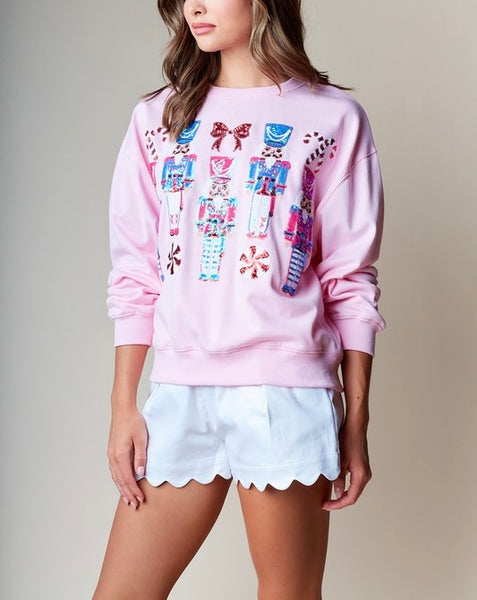 sequin nutcracker pullover / pink